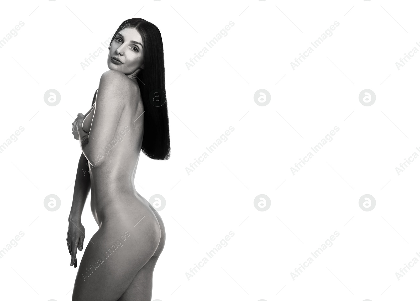 Image of Beautiful nude woman posing on white background. Black and white effect