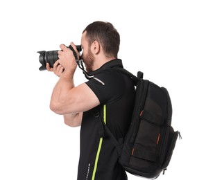 Photo of Photographer with backpack and camera taking picture on white background