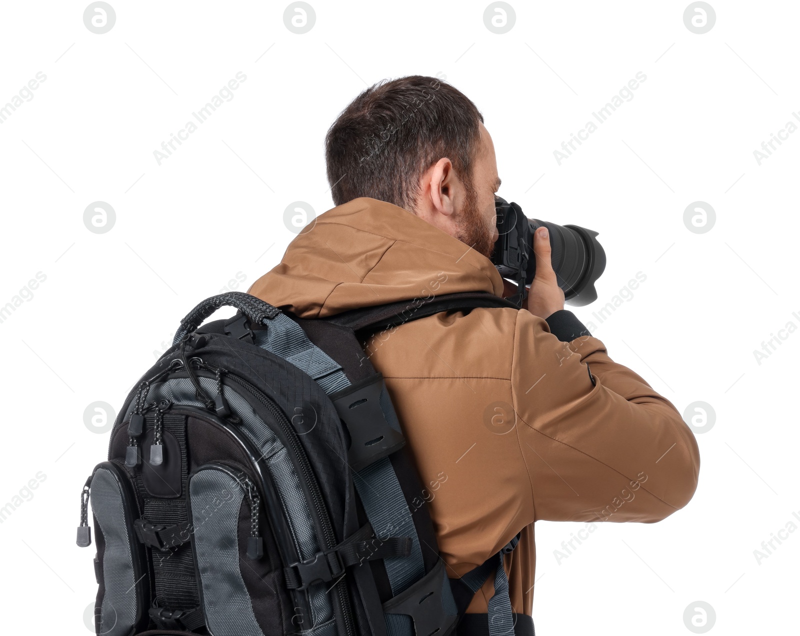 Photo of Photographer with backpack and camera taking picture on white background, back view