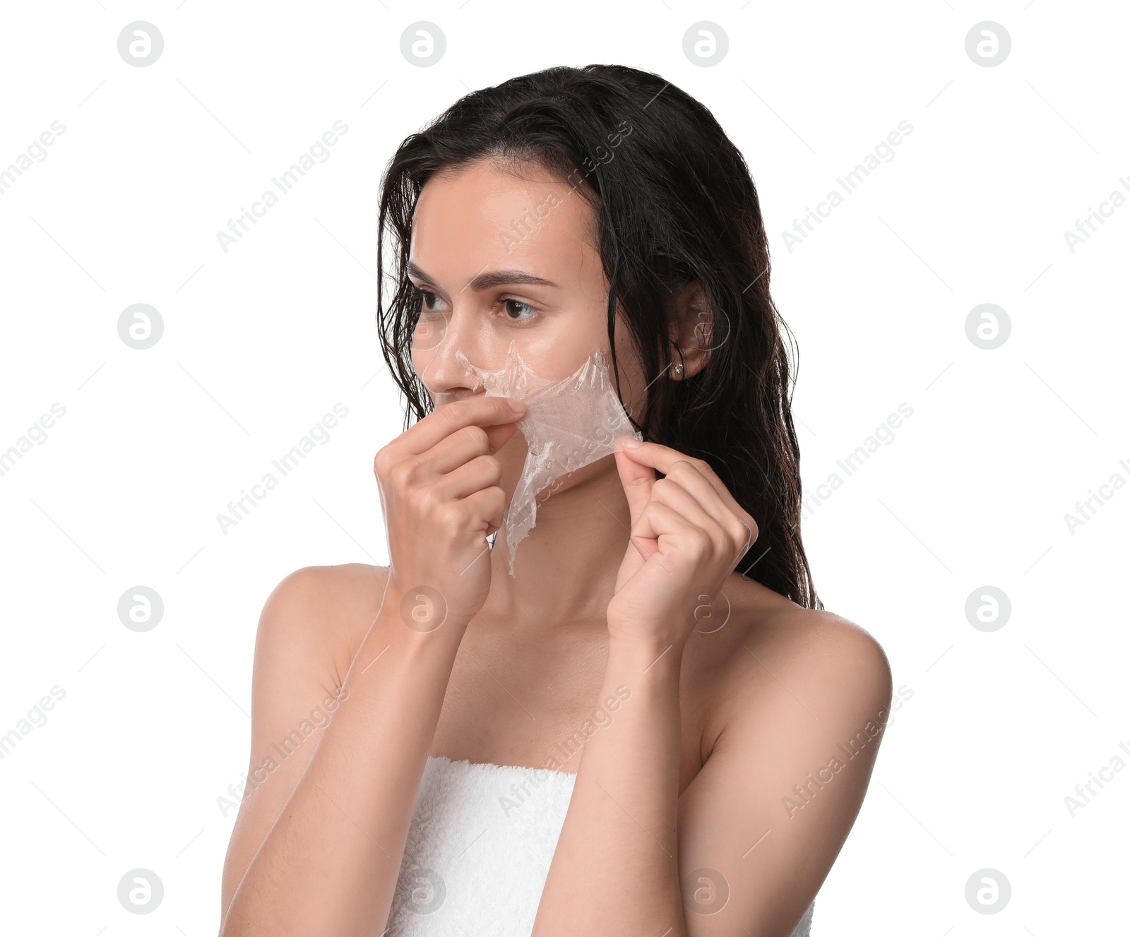 Photo of Beautiful woman peeling off face mask on white background