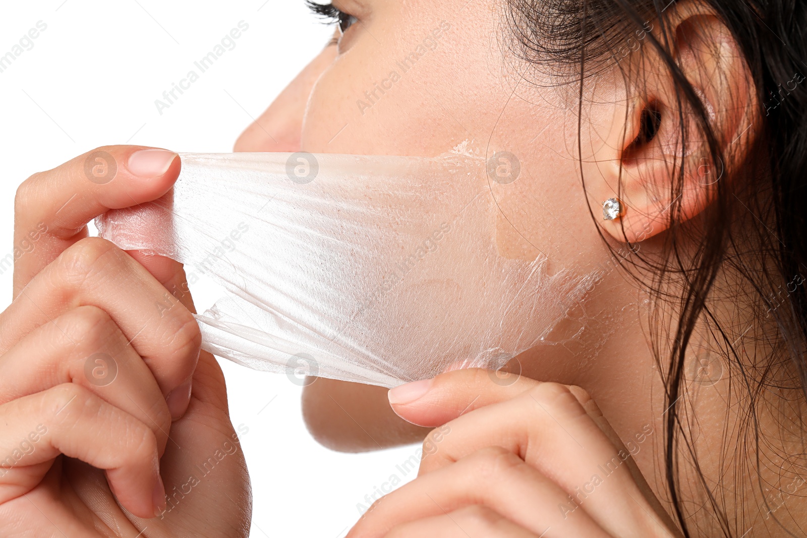 Photo of Woman peeling off face mask on white background, closeup