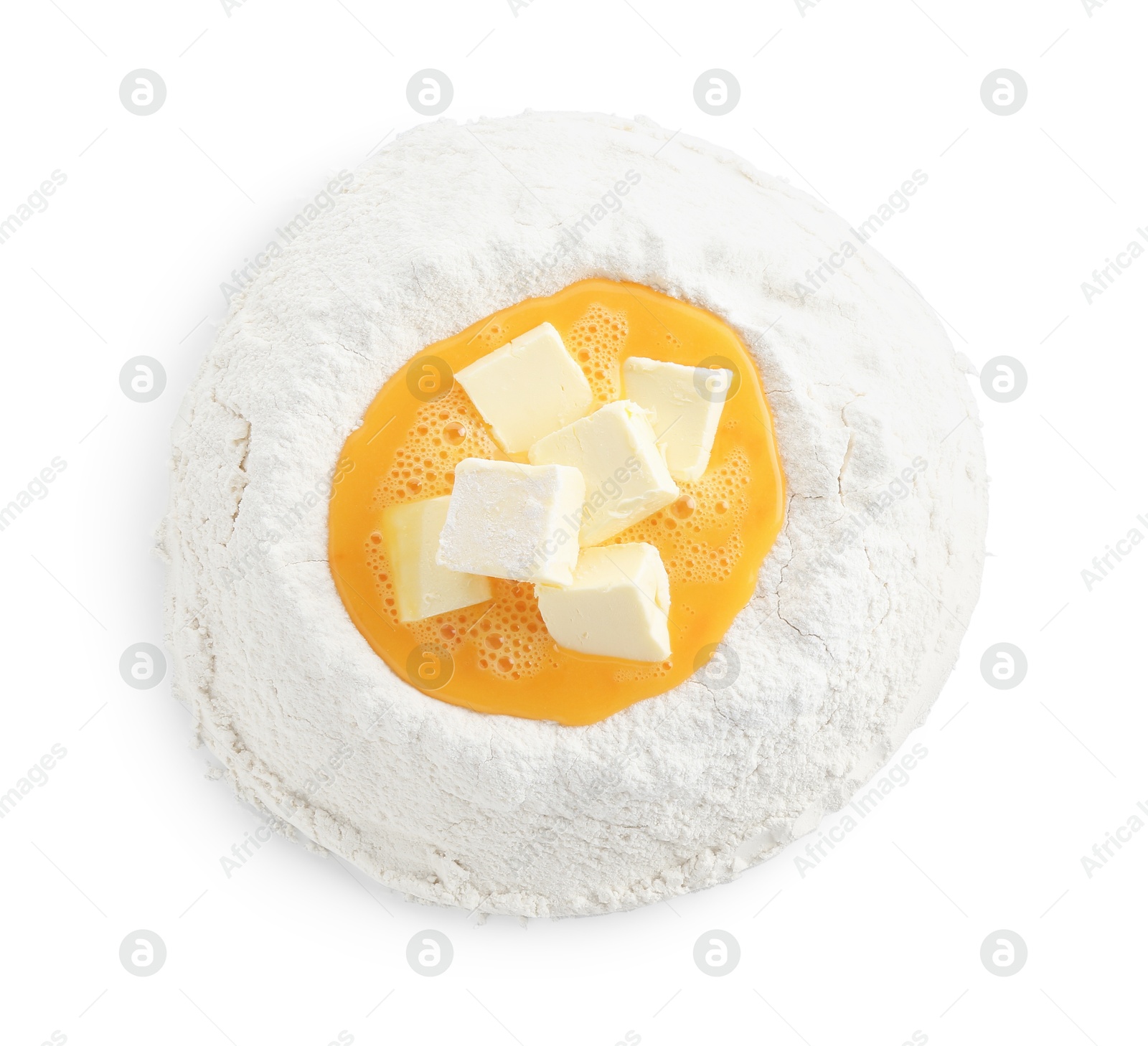 Photo of Cooking homemade pie. Flour with eggs and butter isolated on white, top view