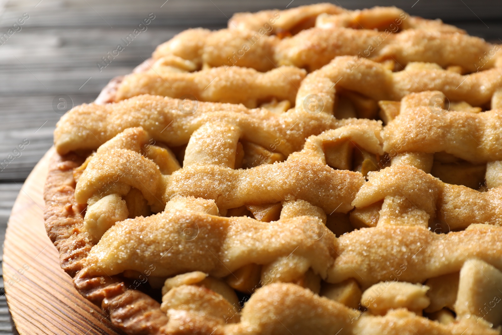 Photo of Tasty homemade apple pie on table, closeup