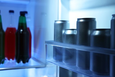 Photo of Many different cold drinks in refrigerator, closeup