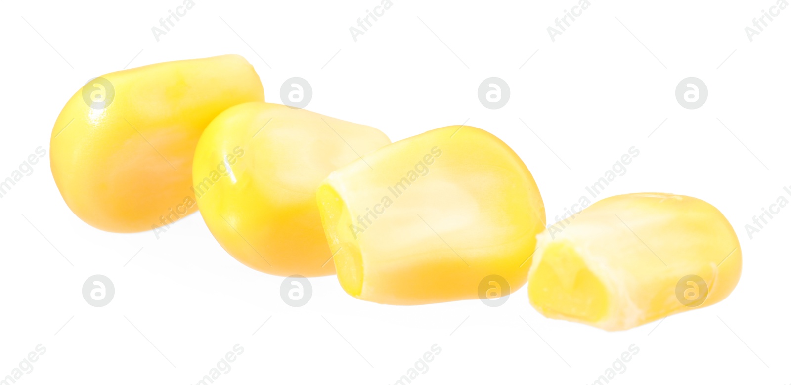 Photo of Fresh ripe corn kernels isolated on white