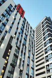 Exterior of modern building against blue sky, low angle view