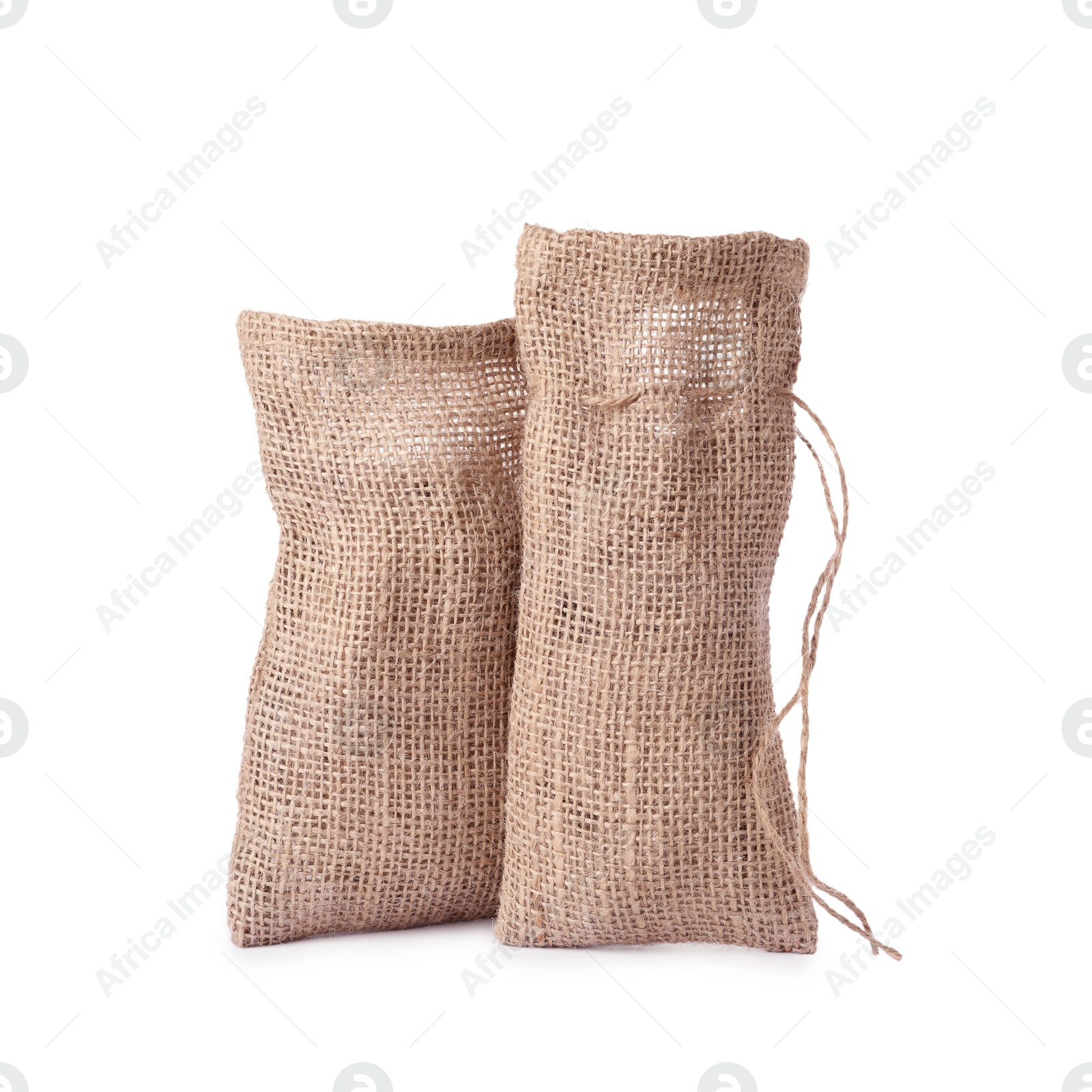 Photo of Two natural burlap sacks isolated on white