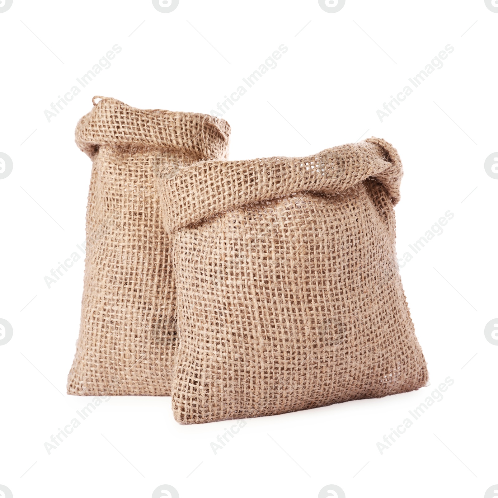 Photo of Two natural burlap sacks isolated on white