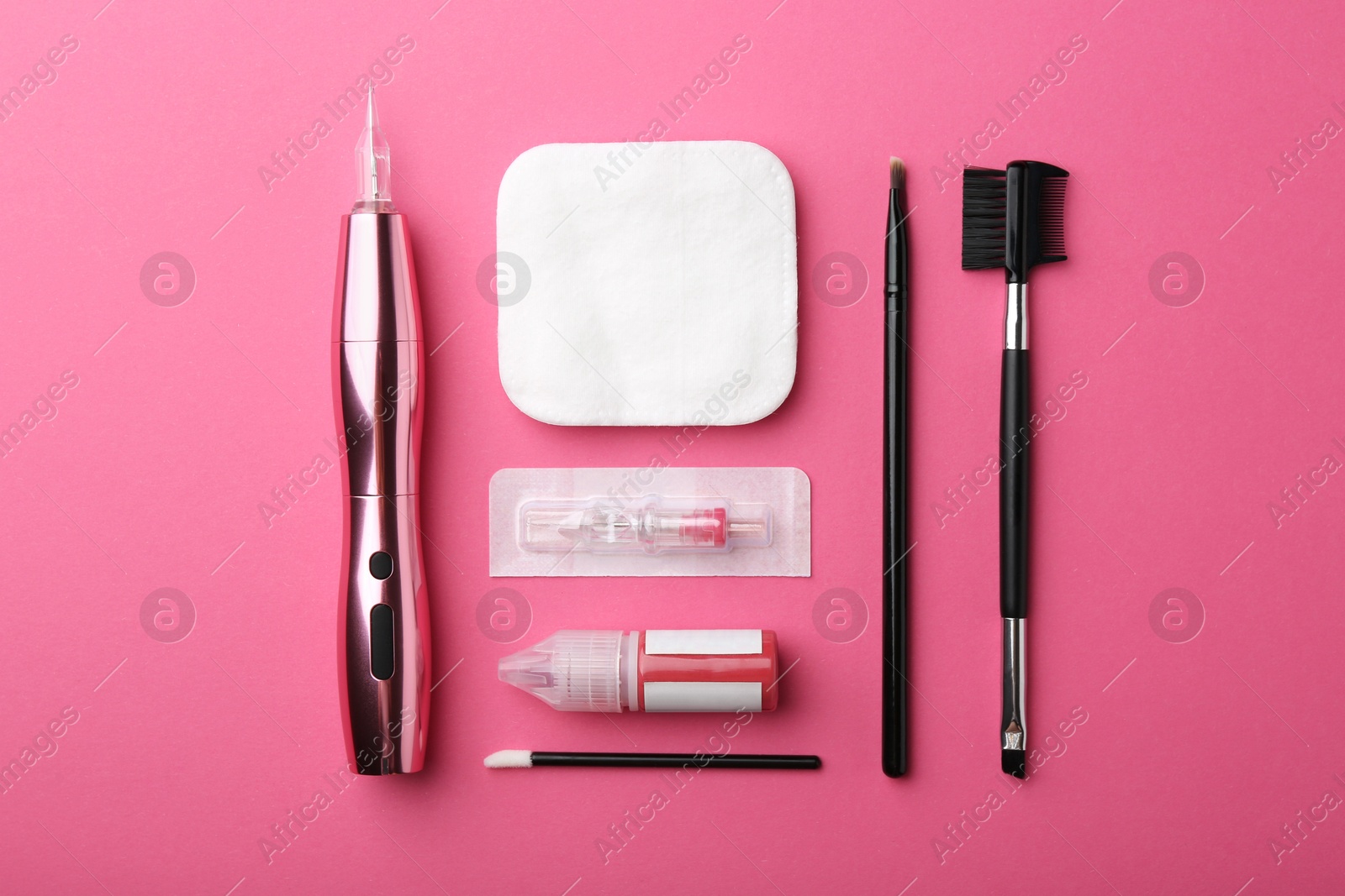 Photo of Permanent makeup equipment kit on pink background, flat lay