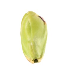 Photo of One peeled pistachio nut isolated on white