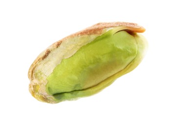 Photo of One peeled pistachio nut isolated on white