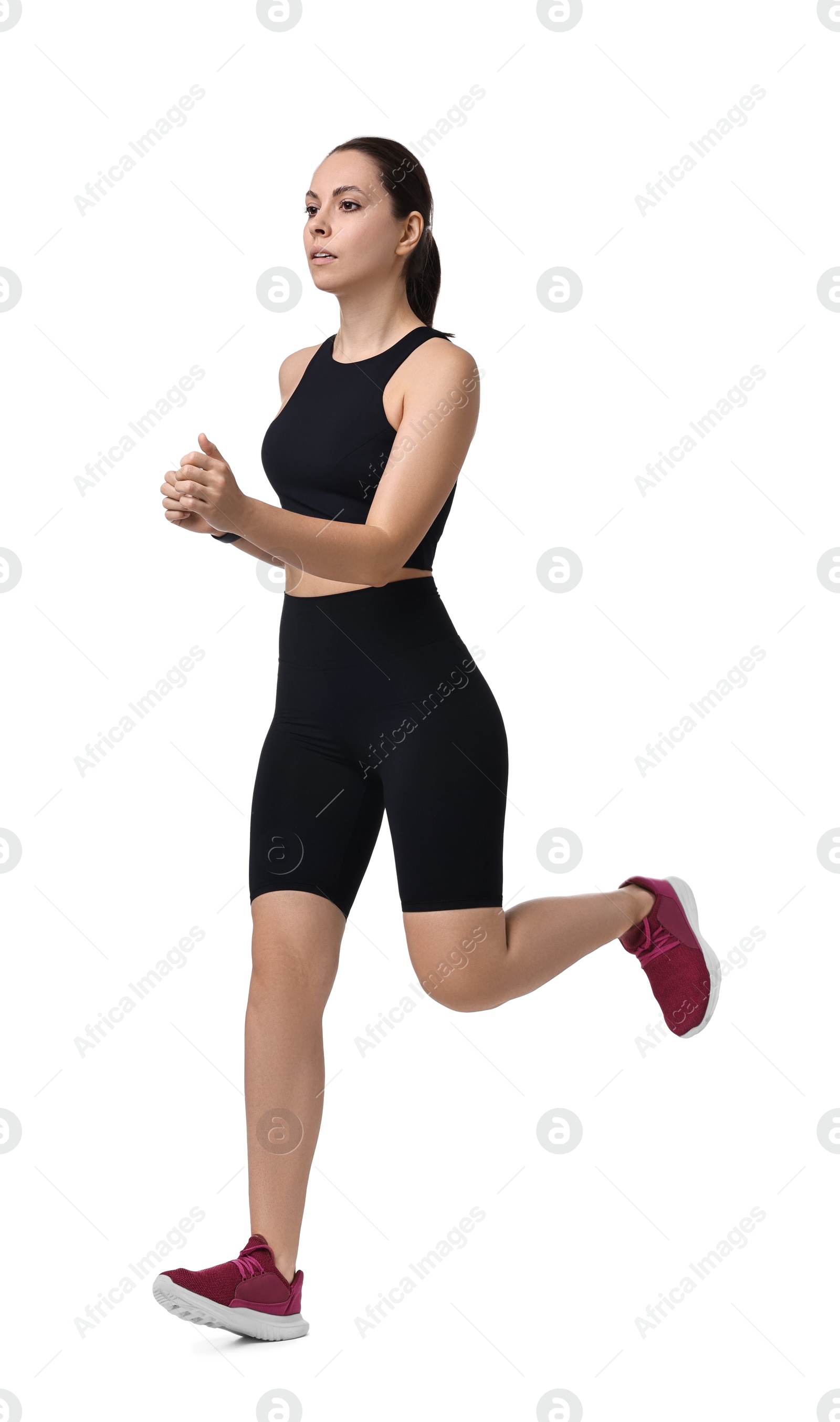 Photo of Athletic woman in sportswear running on white background