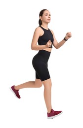 Athletic woman in sportswear running on white background