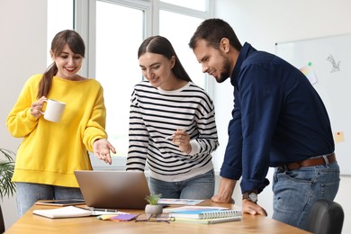 Group of designers working together in office