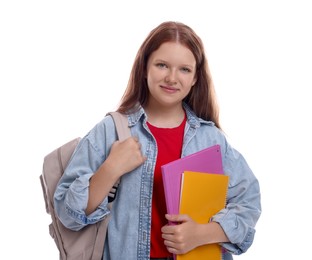 Photo of Teenage girl with backpack and books on white background