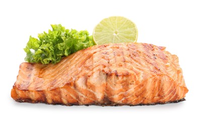 Photo of Delicious grilled salmon fillet with lime and lettuce isolated on white