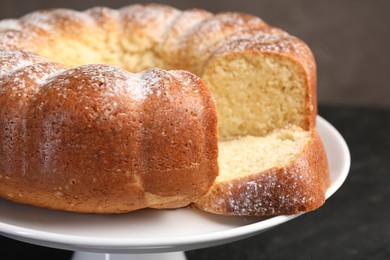 Freshly baked sponge cake on table, closeup