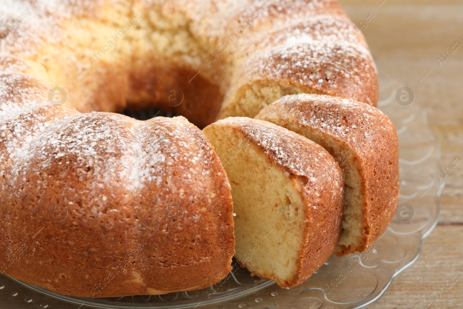 Photo of Freshly baked sponge cake on table, closeup