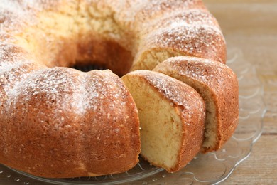 Freshly baked sponge cake on table, closeup