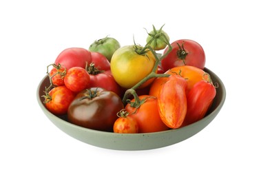 Photo of Different ripe tomatoes in bowl isolated on white