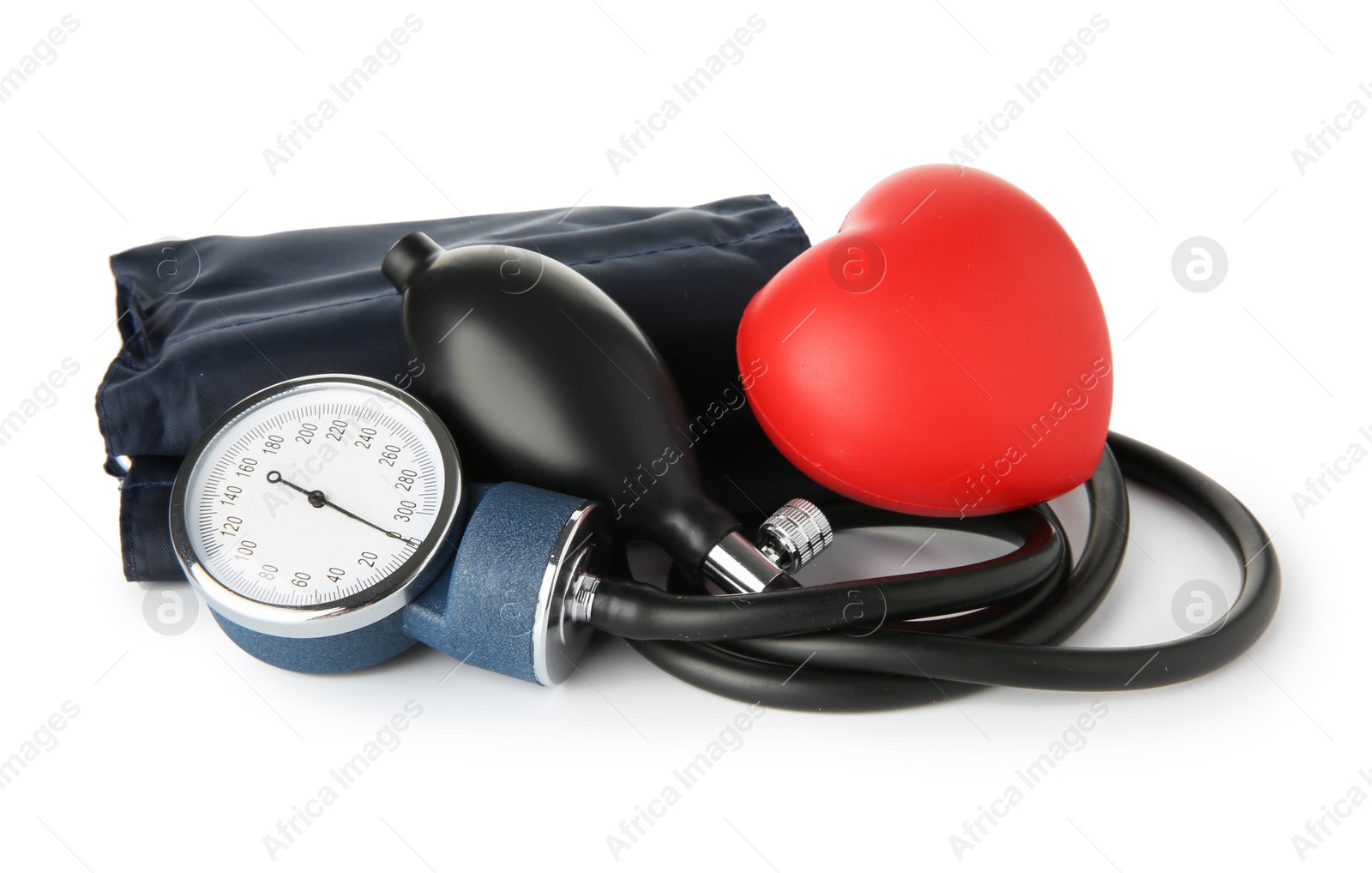 Photo of Blood pressure measuring device and red decorative heart isolated on white