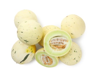 Photo of Fresh ripe honeydew melons isolated on white, top view