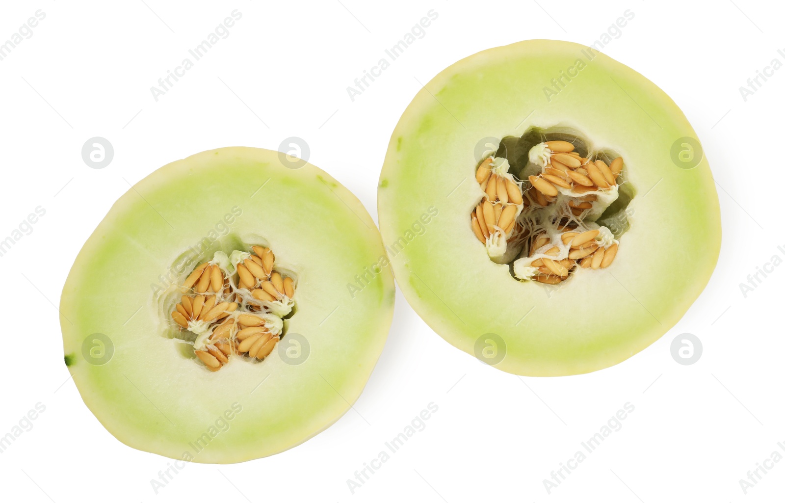 Photo of Cut fresh ripe honeydew melon isolated on white, above view