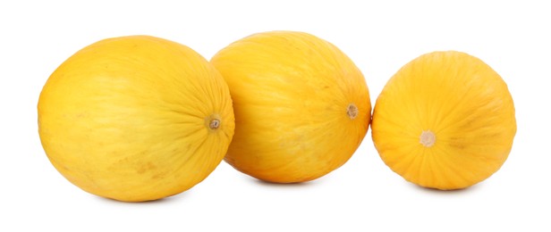 Photo of Three whole ripe melons isolated on white