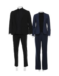 Female and male mannequins with stylish suits isolated on white