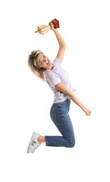 Photo of Happy winner with golden trophy cup jumping on white background