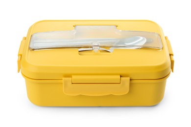 Photo of Yellow lunch box with cutlery isolated on white