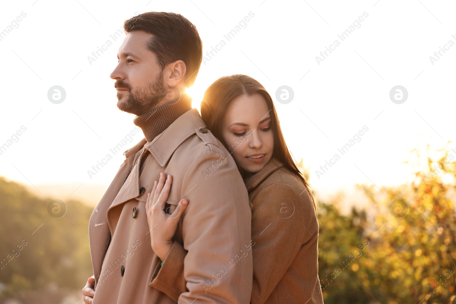 Photo of Beautiful couple enjoying their time together outdoors in autumn evening