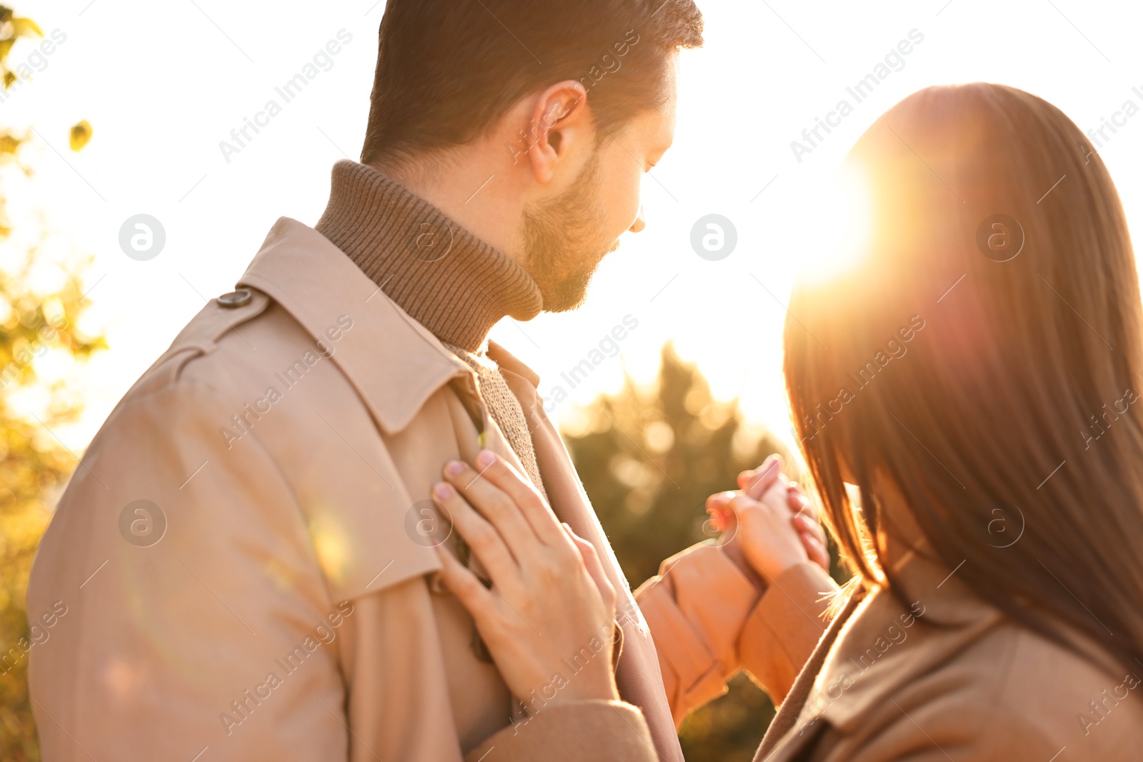 Photo of Beautiful couple dancing in park on sunset