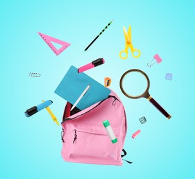 Image of Pink backpack and school stationery in air on light blue background