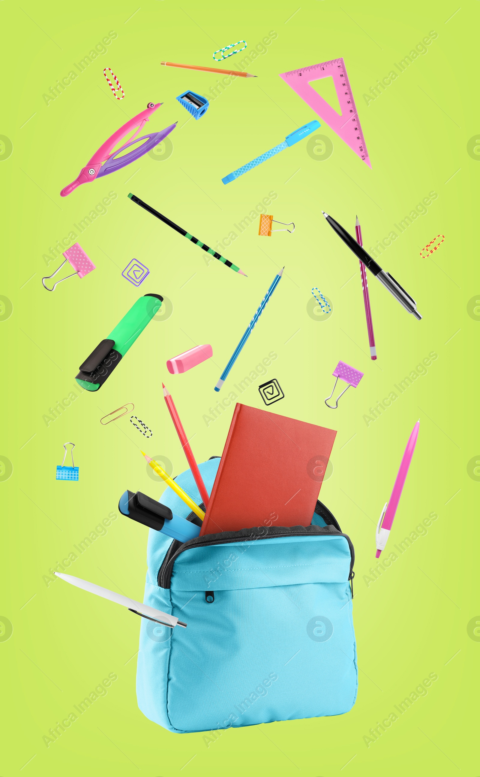 Image of Backpack and school stationery in air on light green background