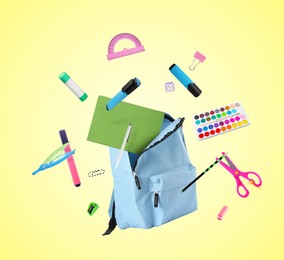 Image of Backpack and school stationery in air on light yellow background