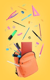 Image of Orange backpack and school stationery in air on golden background