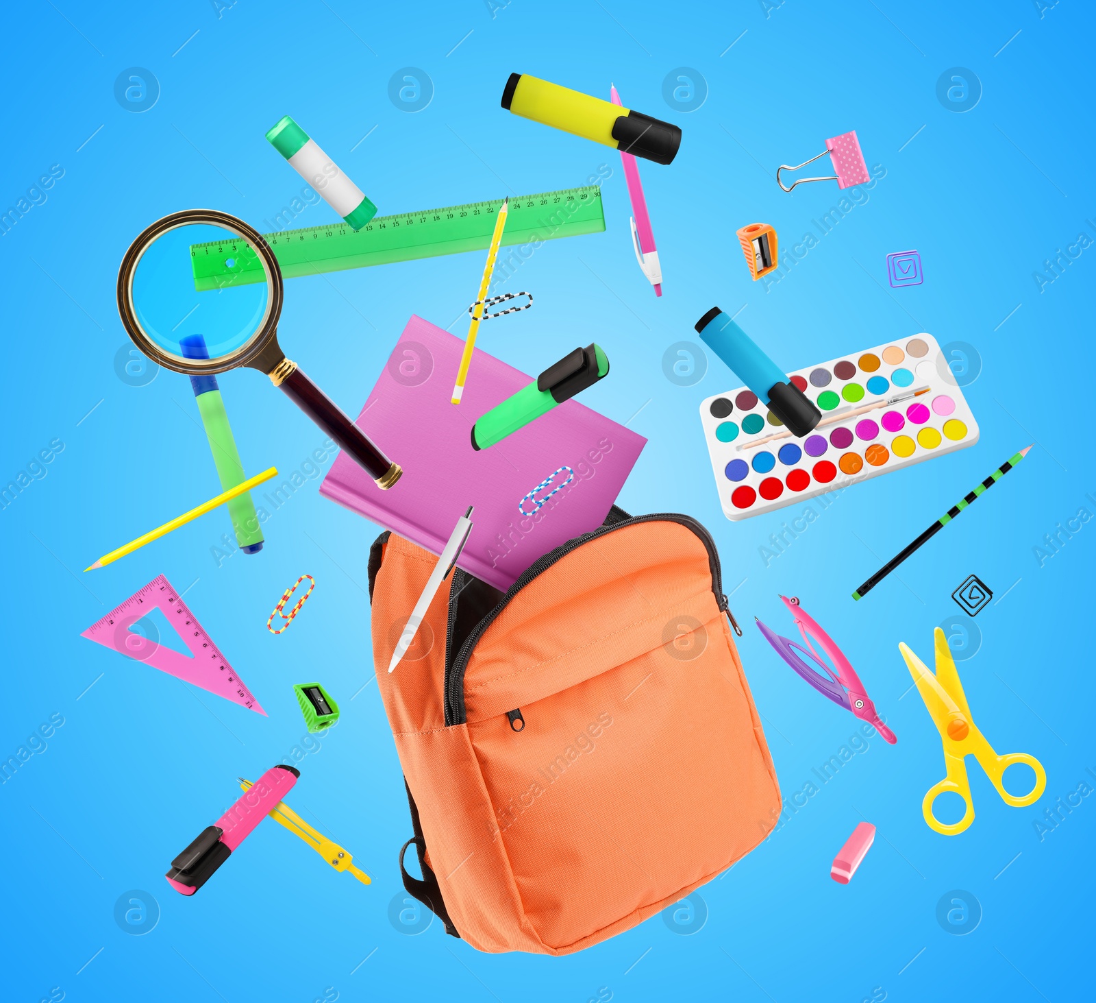 Image of Orange backpack and school stationery in air on light blue background