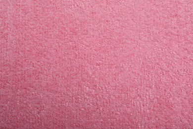 Photo of Pink microfiber cloth as background, top view