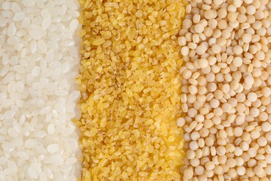 Different cereal grains as background, top view