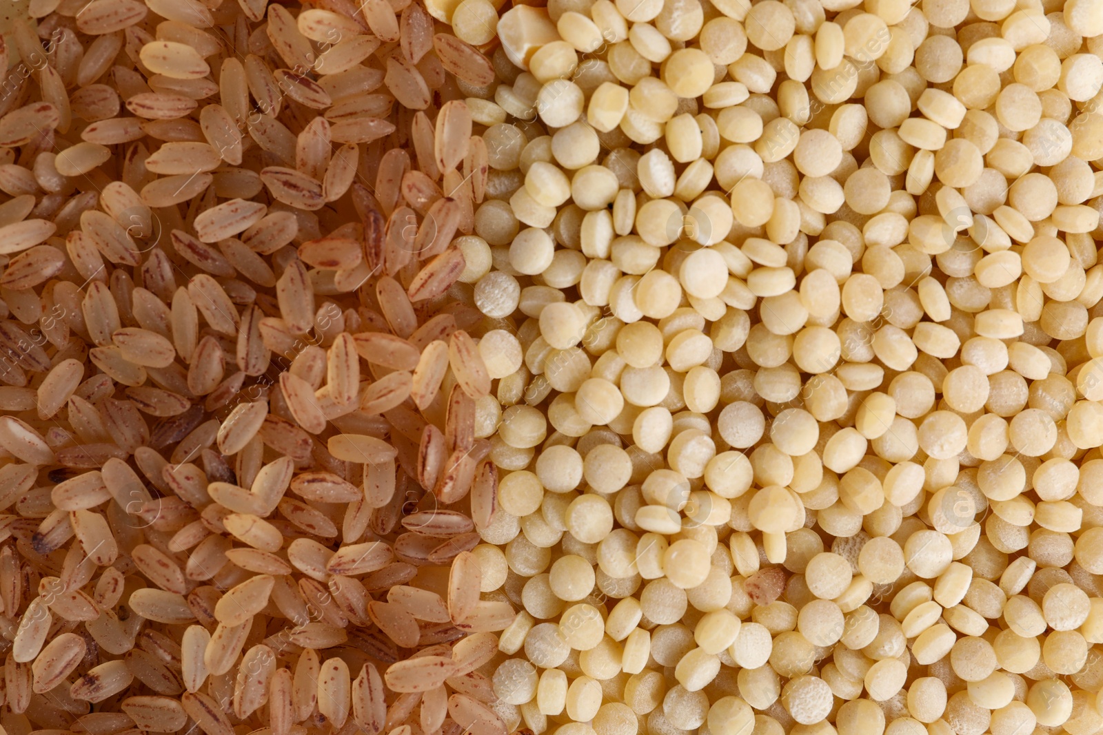 Photo of Different cereal grains as background, top view