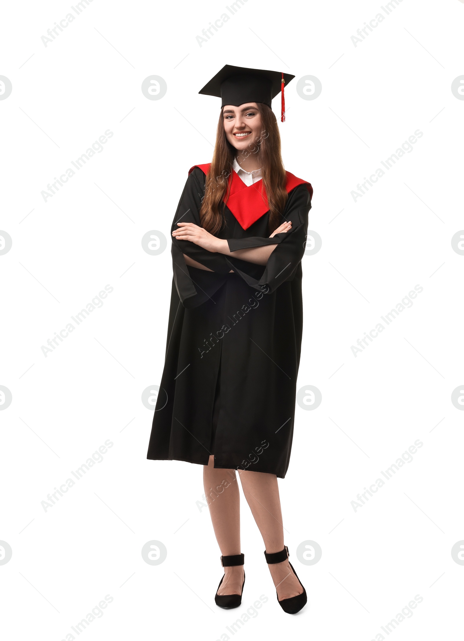 Photo of Happy student with crossed arms after graduation on white background