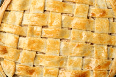 Photo of Tasty homemade pie as background, top view