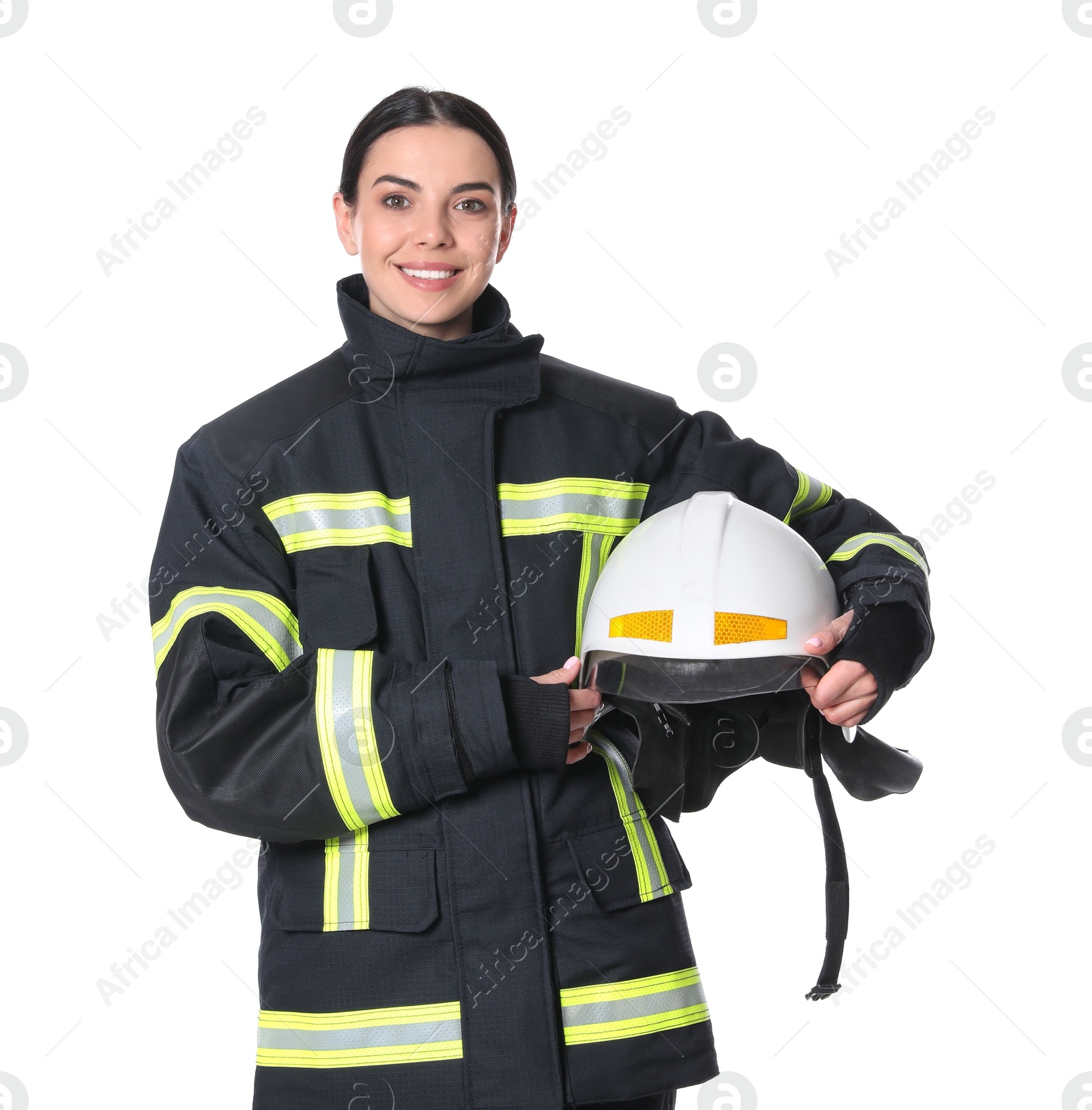 Photo of Portrait of firefighter in uniform with helmet on white background