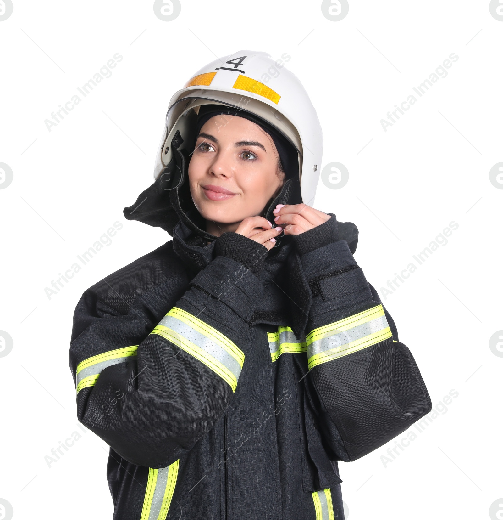 Photo of Portrait of firefighter in uniform wearing helmet on white background