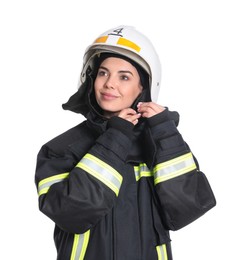 Portrait of firefighter in uniform wearing helmet on white background