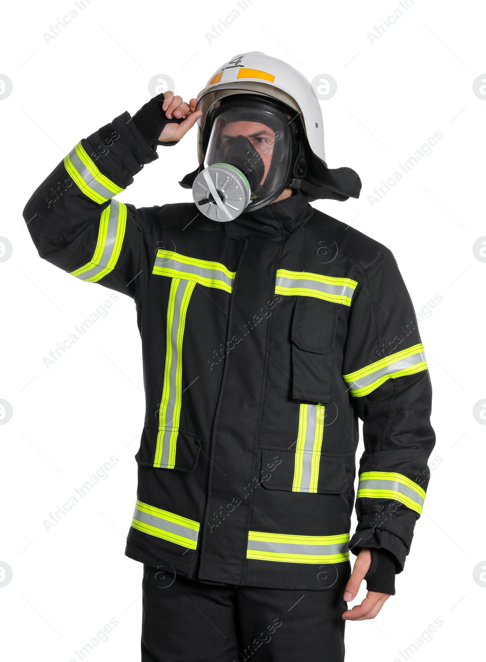 Photo of Portrait of firefighter in uniform, helmet and gas mask on white background