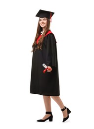 Happy student with diploma after graduation on white background