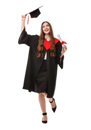 Happy student with diploma after graduation on white background