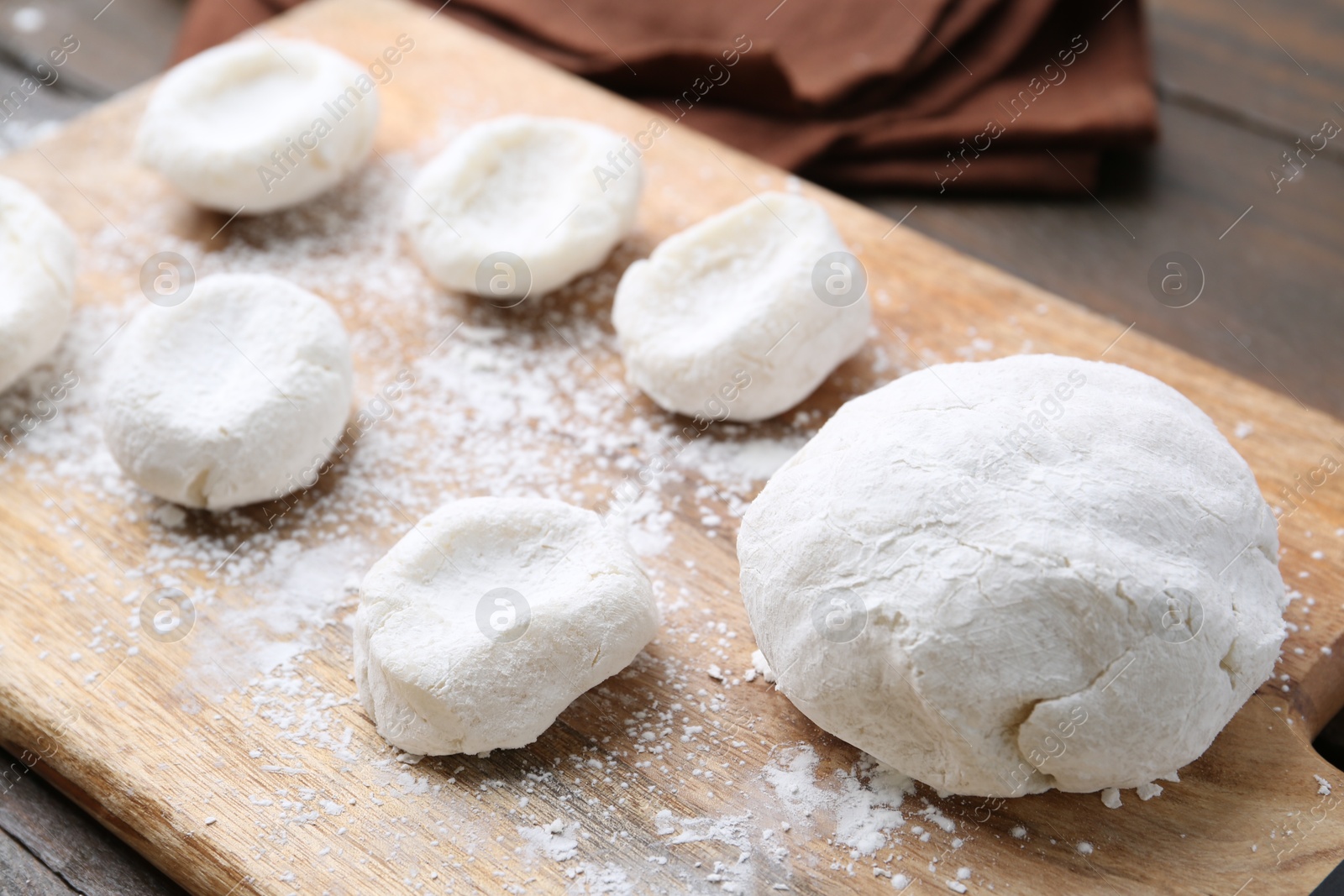 Photo of Dough for tasty homemade mochi on wooden table, closeup